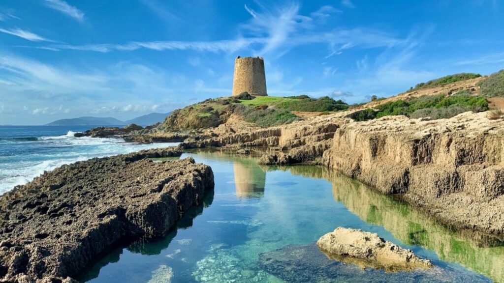 Sardinian sea view with nuraghe tower